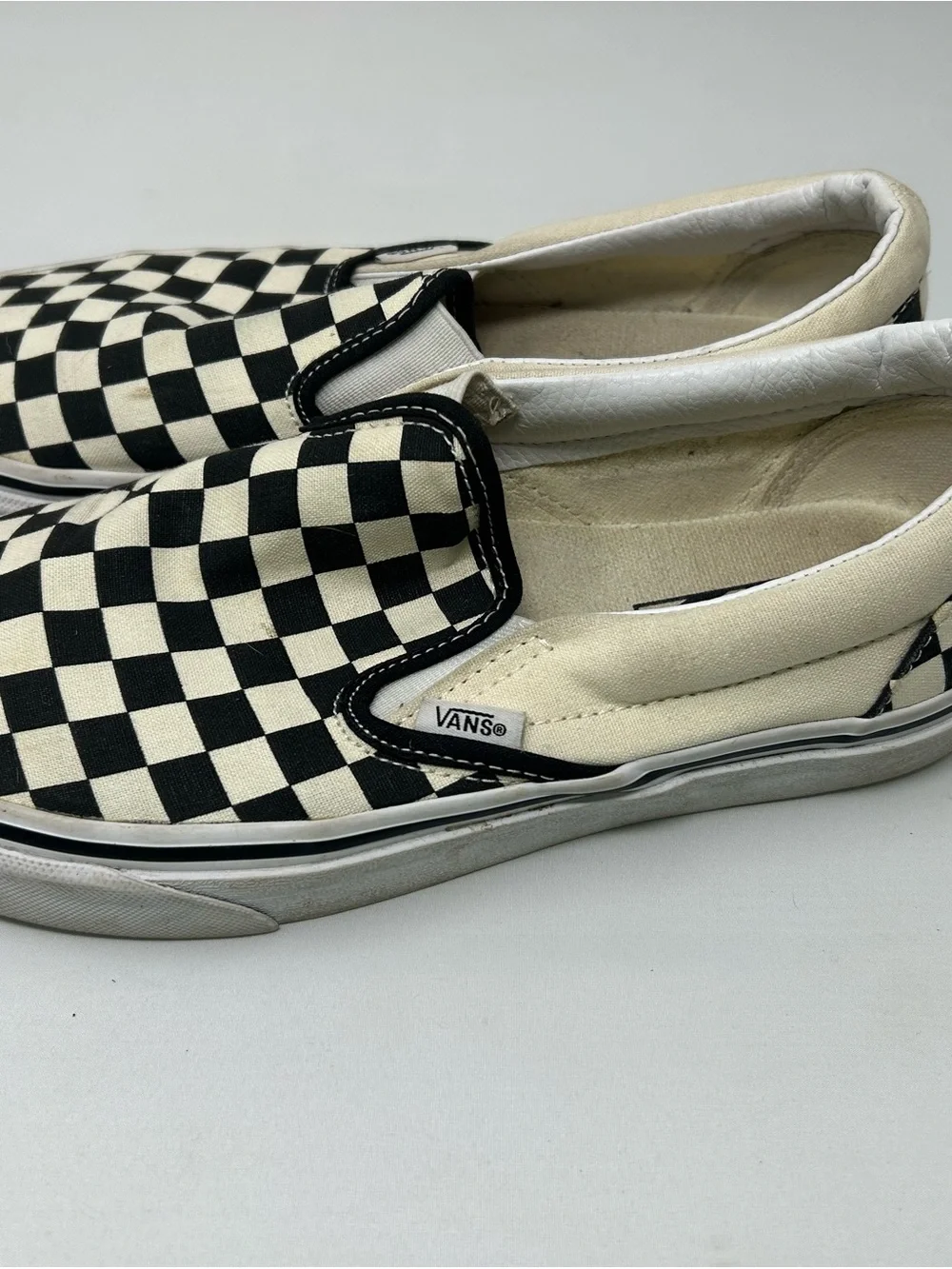 Vans Slip-On Checkerboard Canvas Sneakers in Black and White